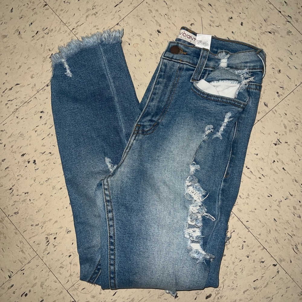 Vibrant Distressed Blue Denim Jeans